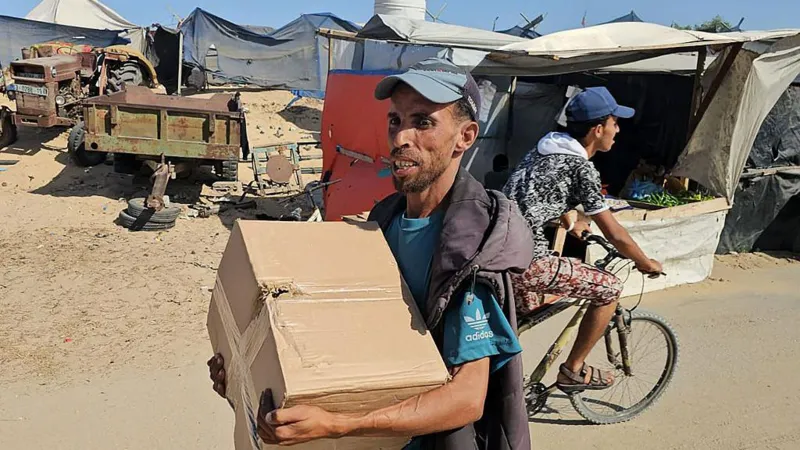 Grupo humanitario respaldado por EE.UU. comienza distribución de ayuda en Gaza en medio de fuertes críticas 05d1dbc0-3b05-11f0-8b5d-0de34fc45231.jpg